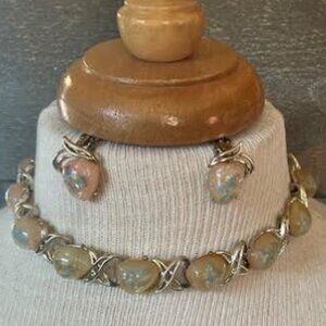 Gold tone choker necklace with matching clip-on earrings